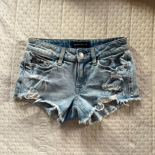 Distressed low rise denim shorts