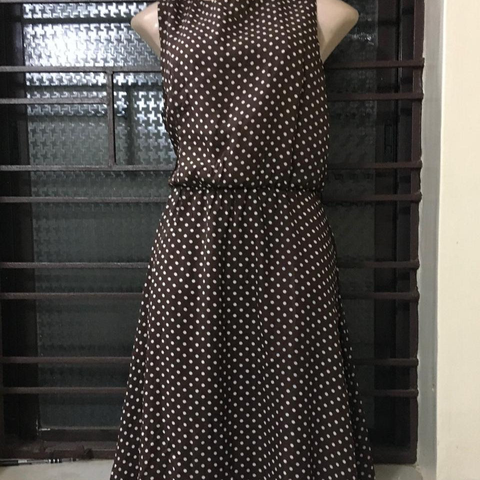 A Classic Sleeveless Midi Dress